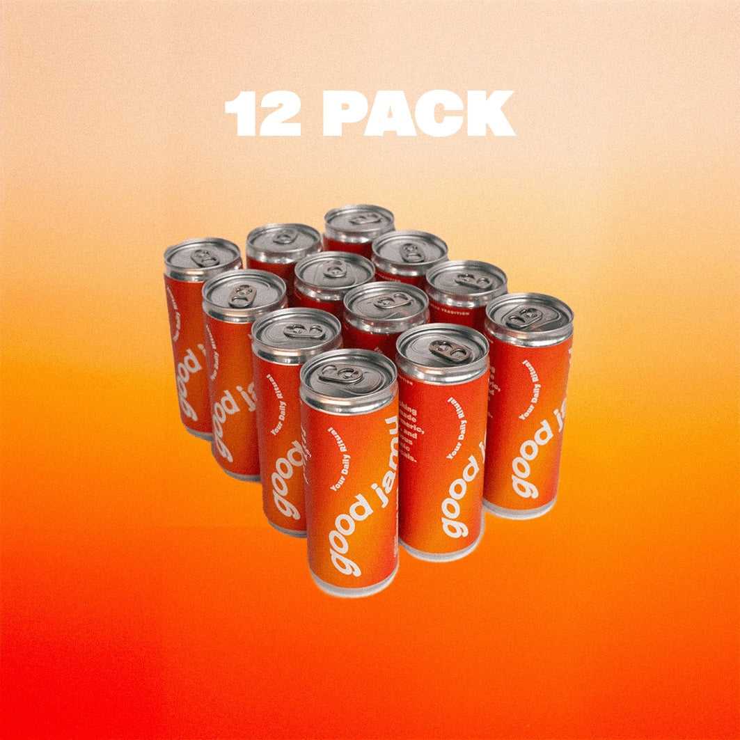 12-pack biologische Turmeric Soda in oranje-blikjes met kurkuma, gember en limoen. Verfrissende jamu frisdrank voor natuurlijke wellness.