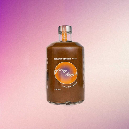 Island Ginger - Biologische Gember Drank in glazen fles van 500ml met paars-oranje label, ideaal voor detox en energieboost.