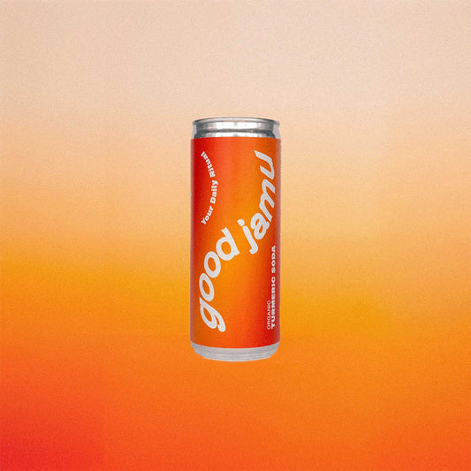 Turmeric Soda - Biologische Turmeric Frisdrank van Good Jamu in oranje blikje met kurkuma, gember en limoen voor een natuurlijke wellness-boost.